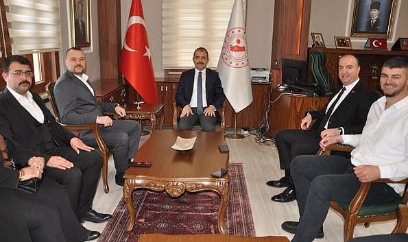 MHP Belediye Başkan Adayları Kaymakam Erdinç Dolu'yu ziyaret etti