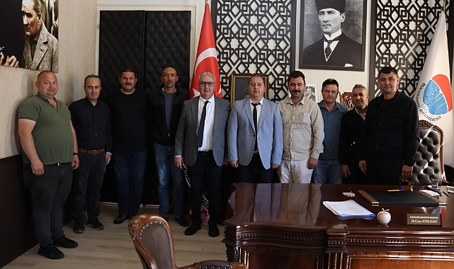 Bayramiç Belediyesi şoförleri ve zabıta amiri, Başkan Hasan Cem Atılgan'ı ziyaret etti