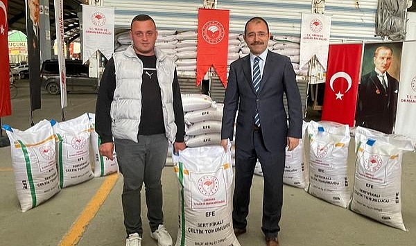 Biga Kaymakamı Erdinç Dolu, hibeli çeltik tohumu dağıtım programına katıldı