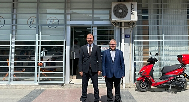 Erdinç Dolu, tapu müdürü Kazım Dülger'i ziyaret etti