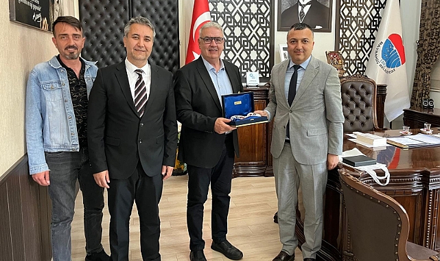 UEDAŞ yetkililerinden Bayramiç Belediye Başkanı Hasan Cem Atılgan'a tebrik ziyareti
