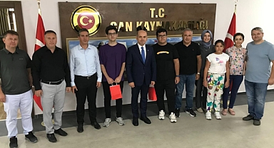 Kaymakam Dr. Emre Nebioğlu, YKS ve LGS'de dereceye giren öğrencilerle buluştu