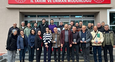 Emekli personellere plaket töreni